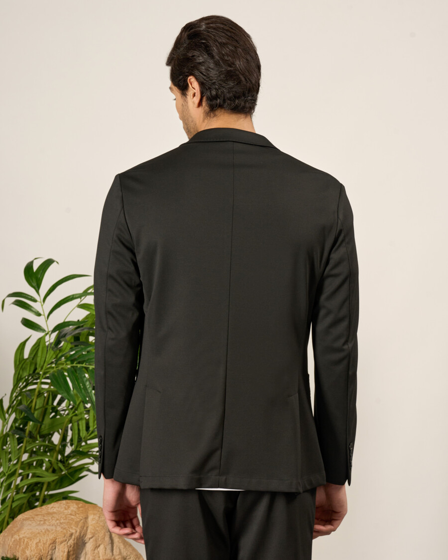 costume noir ajusté en maille