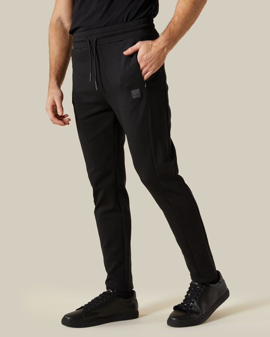 pantalon de survêtement avec empiècements en caoutchouc sur la poitrine