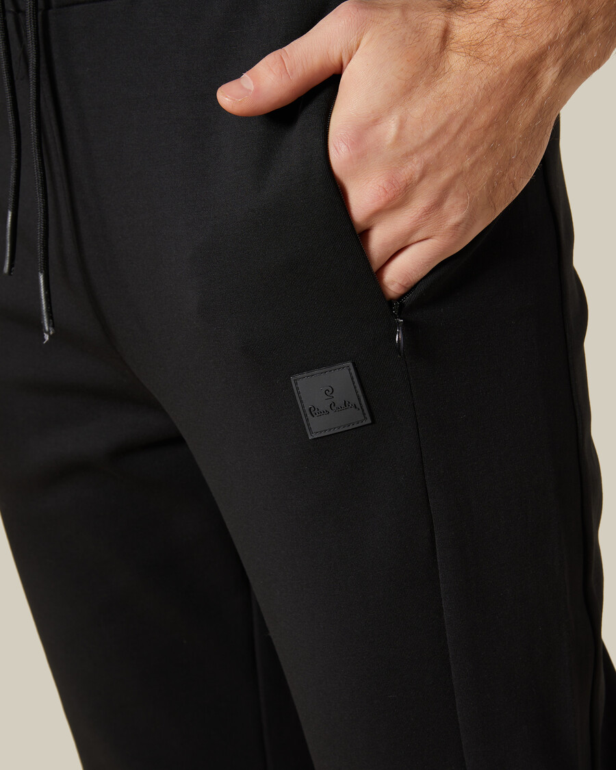 pantalon de survêtement avec empiècements en caoutchouc sur la poitrine