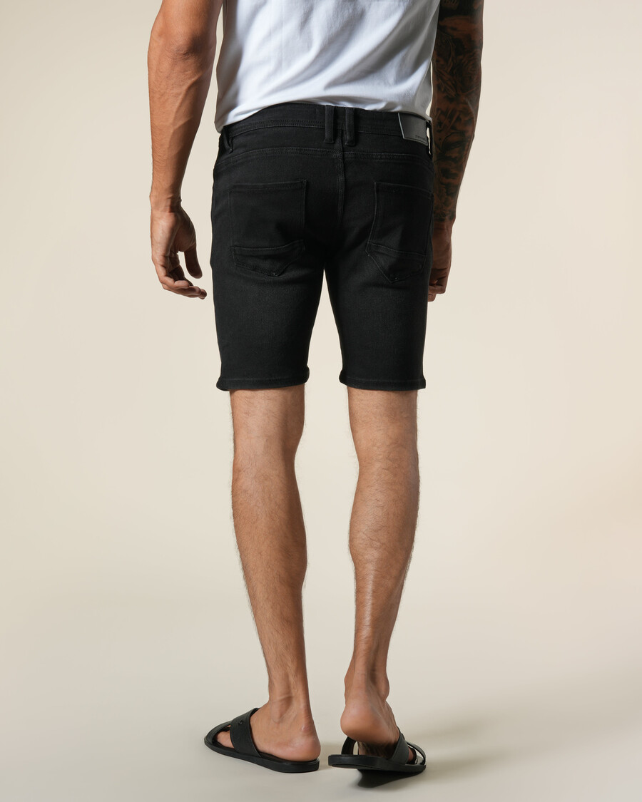 bermuda en jean avec empiècements en cuir