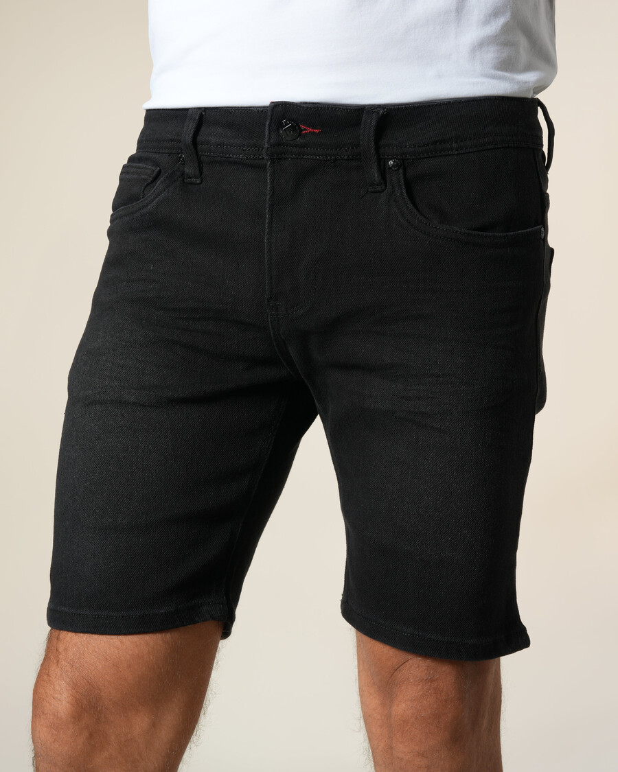 bermuda en jean avec empiècements en cuir