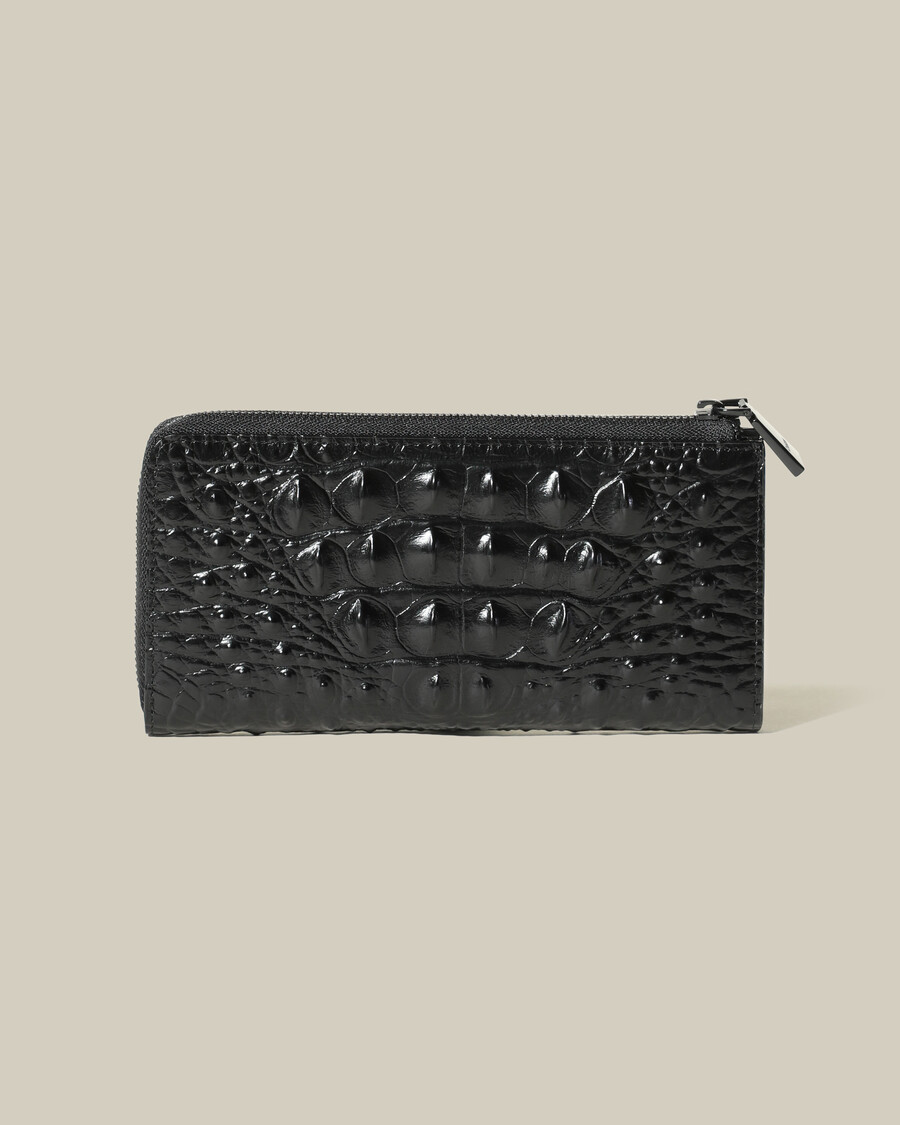 portefeuille zippé en peau de crocodile
