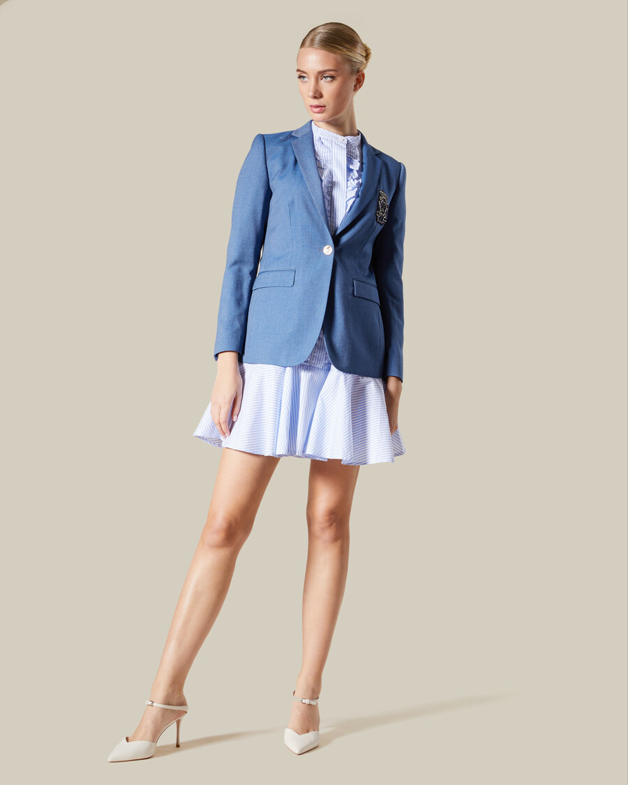veste de costume à un bouton et à écusson